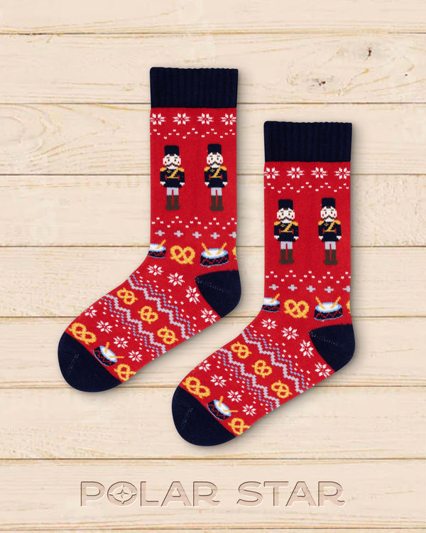 Nøtteknekker nordic socks laid flat, nutcracker and snowflakes in red and navy