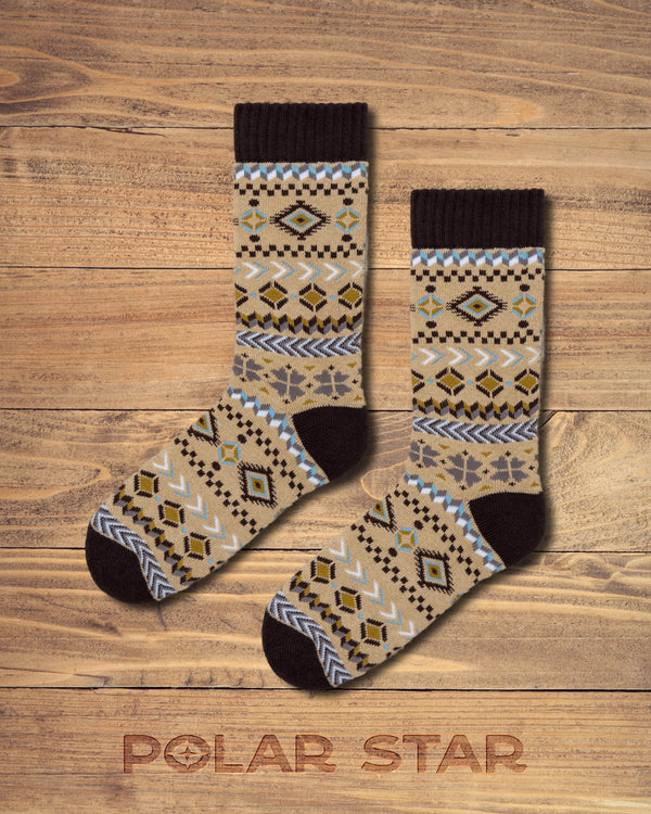 Arild nordic socks by Polar Star, flat pair photographed on wood
