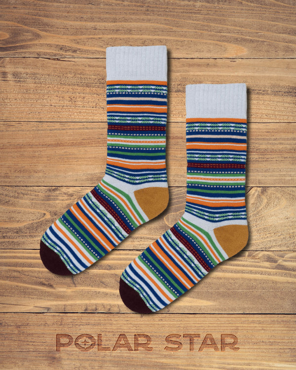 Espen nordic socks by Polar Star, flat pair photographed on wood