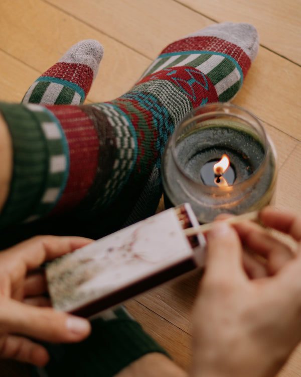 Iver nordic socks worn, overhead view of feet resting on a hiking map