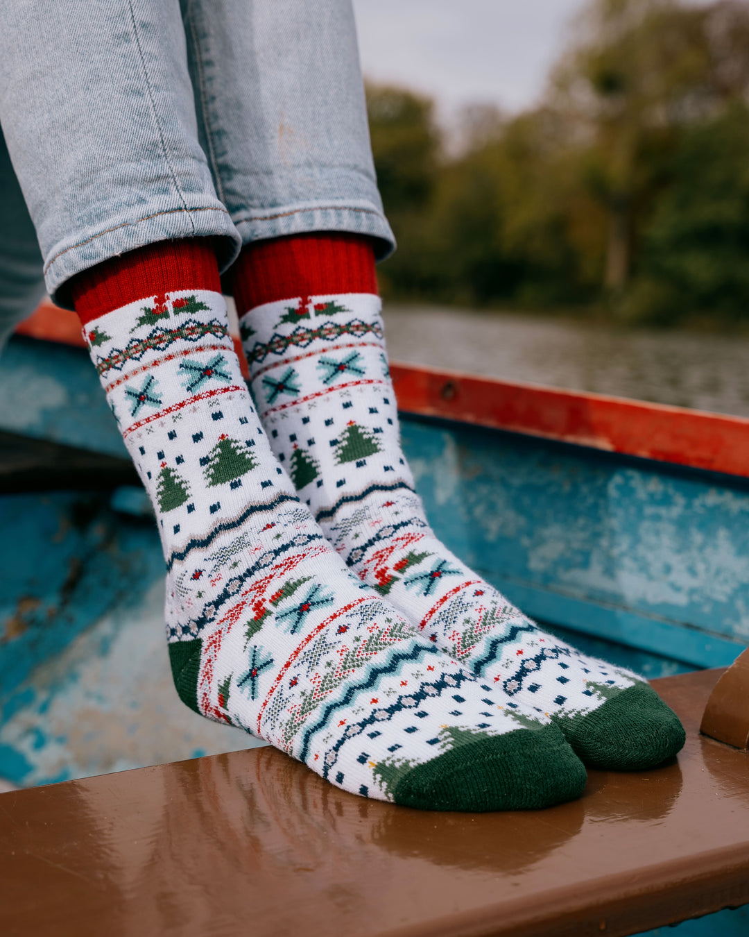 Inga nordic socks worn, overhead view of feet resting on a hiking map