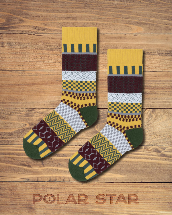 Svea nordic socks by Polar Star, flat pair photographed on wood