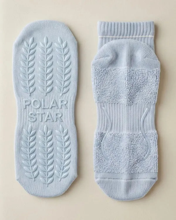Outside: Grips the mat. Inside: Holds your foot.