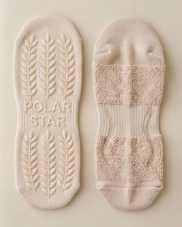 Outside: Grips the mat. Inside: Holds your foot.