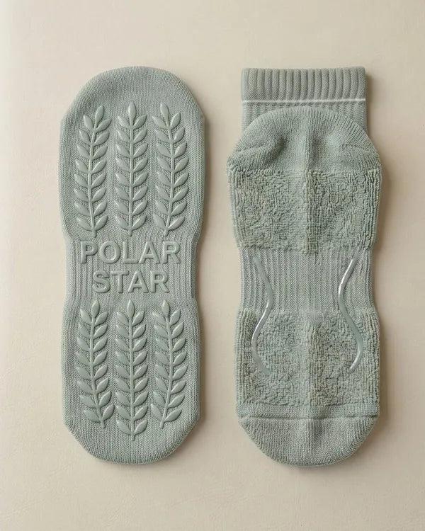 Outside: Grips the mat. Inside: Holds your foot.
