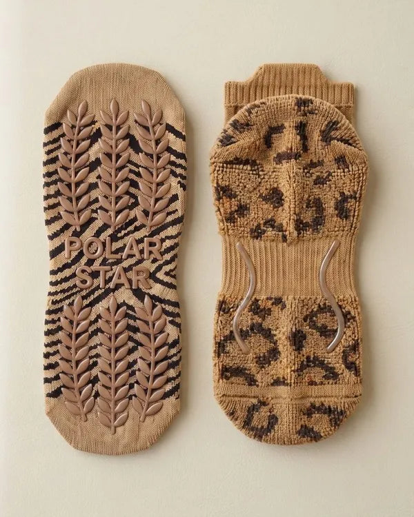 Outside: Grips the mat. Inside: Holds your foot.